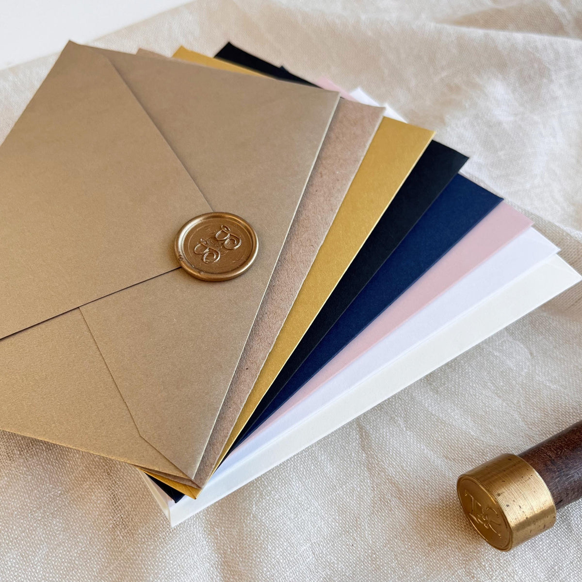 RSVP envelopes in 8 elegant colors, displayed with optional wax seals for wedding invitations