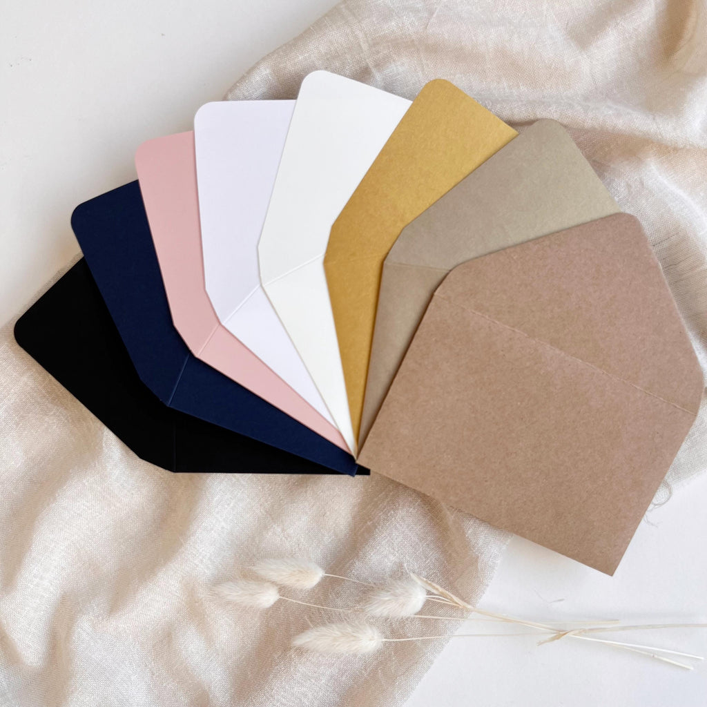 RSVP envelopes for standard cards available in 8 paper colors: Black Matt, Navy Blue Matt, Blush Pink Matt, White Metallic, Cream Matt, Gold Metallic, Old Gold Metallic, and Eco Matt. Perfect wedding invitation envelopes.